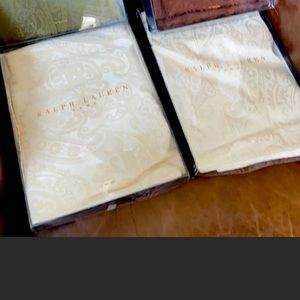 Two Ralph Lauren table cloths. 70” rounds